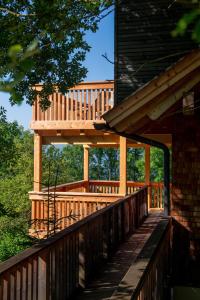a wooden deck on the side of a house at Soami Spaces - Alpine Hideaway in Millstatt