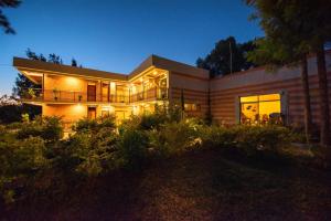 a large house with lights on in the night at Tabor Hotel Lalibela in Lalibela