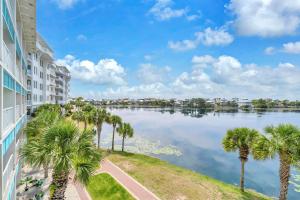 a view of a lake from a building at Carillon Beach Inn 310 in Panama City Beach