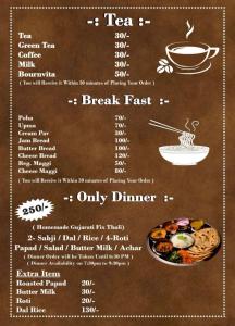 a menu for a tea restaurant with a plate of food at Unity homestay in Garudeshwar +20 photos