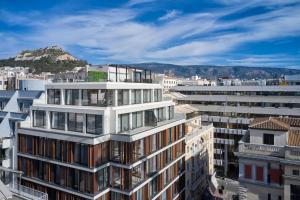 an aerial view of a building with buildings at September Athens Residences in Athens