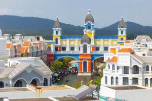a view of a city with a large building at Grand Bay Hotel - Grand World Phu Quoc in Phú Quốc