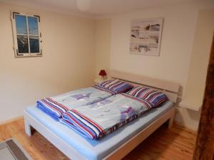 Llit o llits en una habitació de Apartment in Putbus I