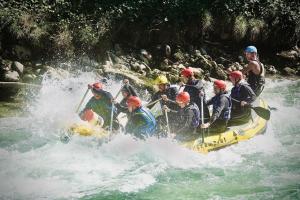 a group of people on a raft in a river at Rafting Camp Palfau in Palfau +163 photos