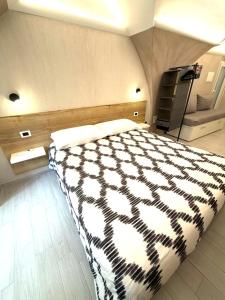 a bedroom with a zebra print bed in a room at Casapà in Atrani