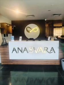 a sign for an akoyaarma in a store at Anasvara Hotels in Mysore