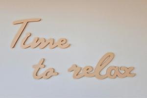 a sign that says time is healing and a sign that reads line is healing at Sable & Pampas - Meublé de Tourisme 5 étoiles - Vue Panoramique & Terrasse - Climatisation - Plage à 200m in Carnon-Plage