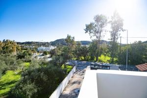 a view from the roof of a house at Natural Quiet Accommodation 3 - Faliraki in Kalithies