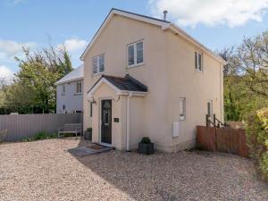 a white house with a fence in front of it at 3 Bed in Stepaside oc-fb047 in Stepaside +16 photos