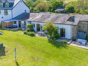 an aerial view of a house with a yard at 1 Bed in Swansea oc-77980 in Penclawdd