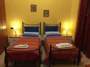 Postel nebo postele na pokoji v ubytování Holiday home Linguaglossa/Sizilien 23272