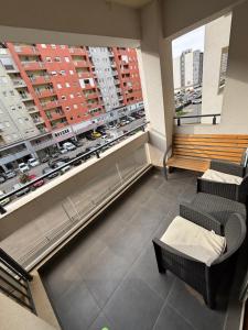 a room with a large window with a view of a city at Ana Lux Master Apartment 14 in Podgorica
