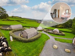 a house with a view of a farm with a mirror at 1 Bed in Corwen oc-80320 in Gwyddelwern