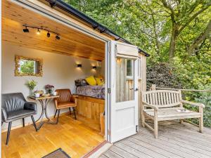 a tiny house with a bed and a patio at 1 Bed in Welshpool oc-92796 in Welshpool +21 photos