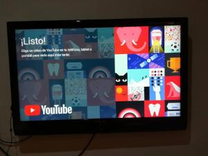a television screen with a website on it at Cas Bufador in Sa Coma