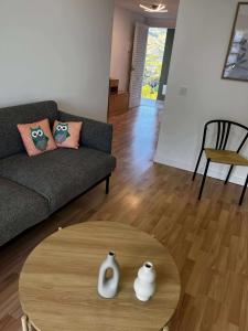 a living room with a couch and a table at Sea & Mountain Views Benicassim in Benicàssim +38 photos