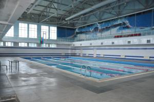 a large swimming pool in a large building at Arena Hotel Tovuz in Tovuz +11 photos