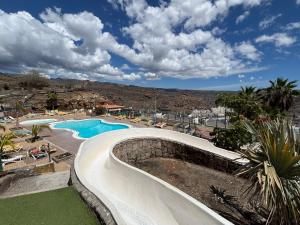 a swimming pool in a resort with at Vista Mar in Mogán