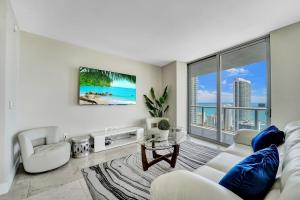a living room with a view of the ocean at Beachwalk Resort in Hallandale Beach