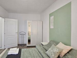 a living room with a couch and a table at Hey! Central Apartment in Gheorgheni