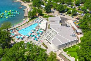 an aerial view of a resort with a swimming pool at Easyatent Mobile home Bijela Uvala in Poreč