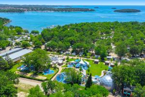 an aerial view of a park with a playground at Easyatent Mobile home Bijela Uvala in Poreč