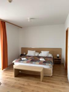 a bedroom with a bed in a room at Hotel Legend in Dunajská Streda