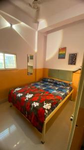 a bedroom with a bed in a room at Green male rooms in Bhopal