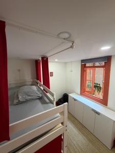 a bedroom with a bunk bed and a window at Guest World in Porto +69 photos
