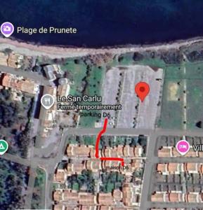 a map of the intersection of a street with a red marker at Maison à proximité de la plage in Prunete +1 photo