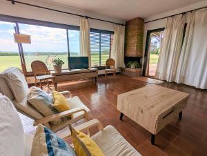 a living room with a couch and a coffee table at El setè cel in Malgrat de Mar