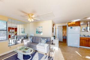 a living room with a couch and a table at Halsell's Hideaway in Indian Pass