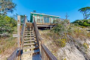 a staircase leading up to a house on the beach at Halsell's Hideaway in Indian Pass