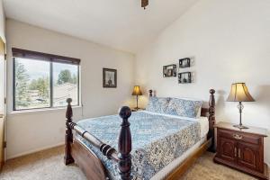 a bedroom with a bed and a window at Pines 4031 in Pagosa Springs