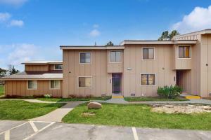 a large house with a driveway in front of it at Pines 4031 in Pagosa Springs