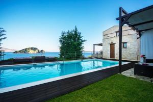 The swimming pool at or close to Exensian Villas & Suites