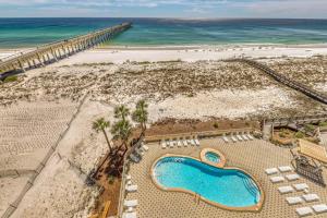 an aerial view of a beach with a swimming pool and the ocean at Inn at Summerwind 0602 in Navarre