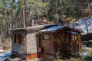 a small cabin in the woods at Campeggio Beaulard in Beaulard