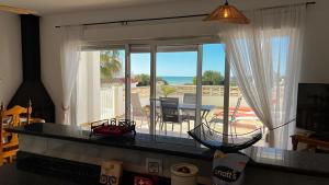 a living room with a view of the ocean at Las estrellas in Peniscola