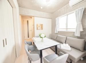 a dining room with a table and chairs at NEW OPEN!! SLEEPLAB 池袋 -ikebukuro- in Tokyo +19 photos