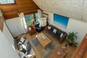 an overhead view of a living room with a couch and a table at Welcome in - Appartement met balkon in Veere I Kievitenlaan 22 in Veere