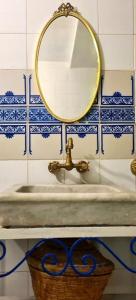 a bathroom with a sink with a mirror on it at Dreaming Rooms - Sidi Bou Saïd in Sidi Bou Saïd +42 photos