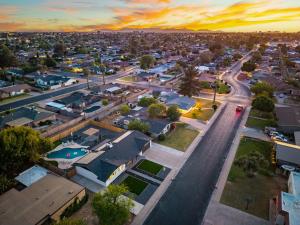 an aerial view of a small town at sunset at Mesa Oasis - Pool - Game Room - Fire Pit in Mesa +72 photos