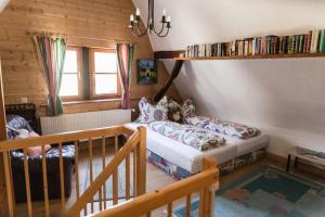 a bedroom with a bunk bed in a house at Ferienhaus Pfalzklause in Billigheim-Ingenheim