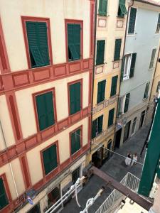 an overhead view of a building with green windows at Bell-House in Varazze