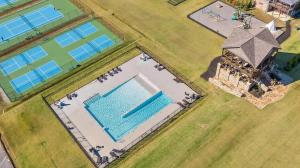 an aerial view of a building with a swimming pool at Azalea & Blackberry Cabins in Jasper