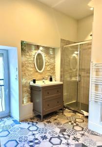 a bathroom with a sink and a shower at Gite de Bourgogne in Sainte-Marie-sur-Ouche +7 photos
