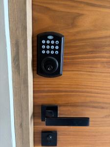 a door with a remote control on it at La Estancia de Rey David in San Luis Potosí