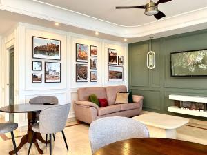a living room with a couch and a table at Hotel Castilla Torrijos in Torrijos