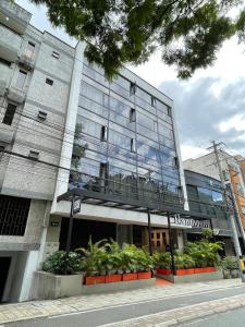 a large building with plants in front of it at Loft 32 Medellín Living in Medellín